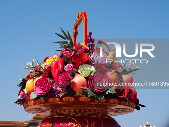 Flower baskets are seen at Tian'anmen Square to celebrate the upcoming National Day in Beijing, China, on September 23, 2024. (