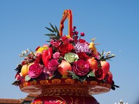 Flower baskets are seen at Tian'anmen Square to celebrate the upcoming National Day in Beijing, China, on September 23, 2024. (