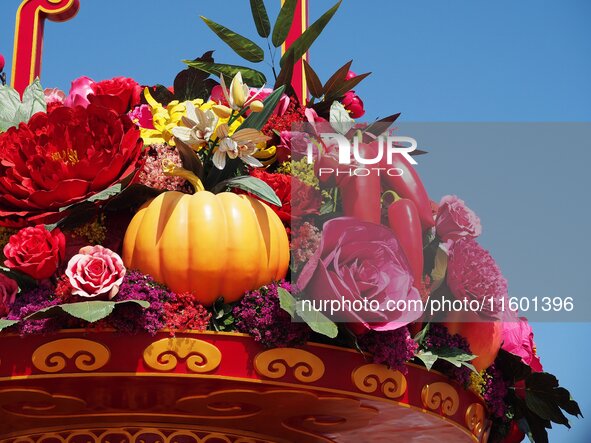 Flower baskets are seen at Tian'anmen Square to celebrate the upcoming National Day in Beijing, China, on September 23, 2024. 