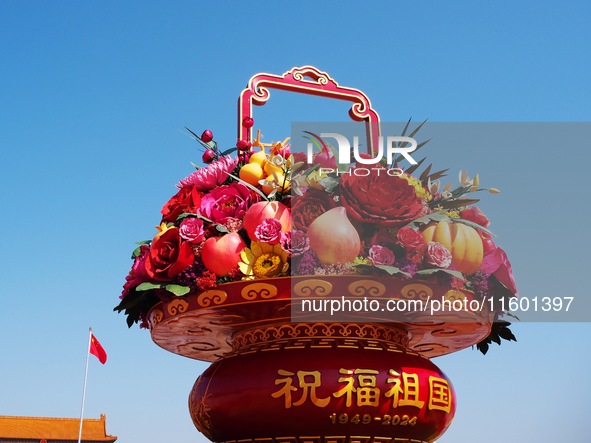 Flower baskets are seen at Tian'anmen Square to celebrate the upcoming National Day in Beijing, China, on September 23, 2024. 