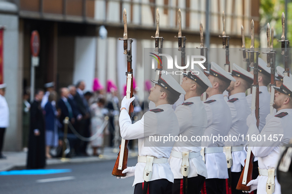 The Mayor of Madrid, Jose Luis Martinez-Almeida, presents a new national flag to the Marine Infantry Grouping of Madrid, donated by the Madr...