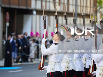 The Mayor of Madrid, Jose Luis Martinez-Almeida, presents a new national flag to the Marine Infantry Grouping of Madrid, donated by the Madr...