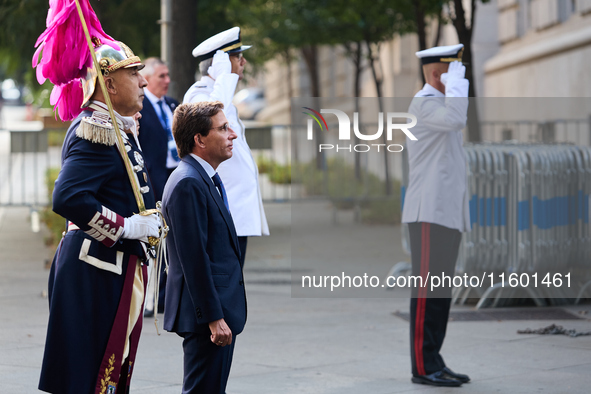 The Mayor of Madrid, Jose Luis Martinez-Almeida, presents a new national flag to the Marine Infantry Grouping of Madrid, donated by the Madr...