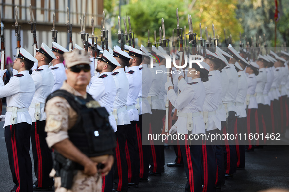 The Mayor of Madrid, Jose Luis Martinez-Almeida, presents a new national flag to the Marine Infantry Grouping of Madrid, donated by the Madr...