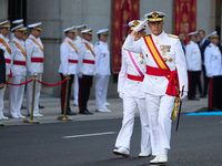 The Mayor of Madrid, Jose Luis Martinez-Almeida, presents a new national flag to the Marine Infantry Grouping of Madrid, donated by the Madr...