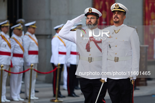 The Mayor of Madrid, Jose Luis Martinez-Almeida, presents a new national flag to the Marine Infantry Grouping of Madrid, donated by the Madr...