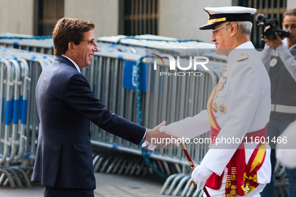 The Mayor of Madrid, Jose Luis Martinez-Almeida, presents a new national flag to the Marine Infantry Grouping of Madrid, donated by the Madr...