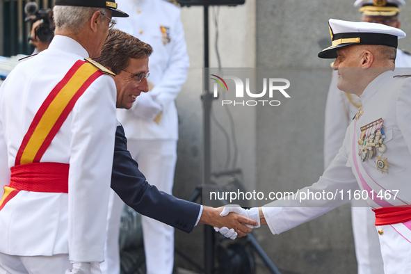 The Mayor of Madrid, Jose Luis Martinez-Almeida, presents a new national flag to the Marine Infantry Grouping of Madrid, donated by the Madr...