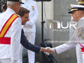 The Mayor of Madrid, Jose Luis Martinez-Almeida, presents a new national flag to the Marine Infantry Grouping of Madrid, donated by the Madr...