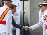 The Mayor of Madrid, Jose Luis Martinez-Almeida, presents a new national flag to the Marine Infantry Grouping of Madrid, donated by the Madr...