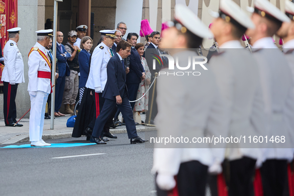 The Mayor of Madrid, Jose Luis Martinez-Almeida, presents a new national flag to the Marine Infantry Grouping of Madrid, donated by the Madr...