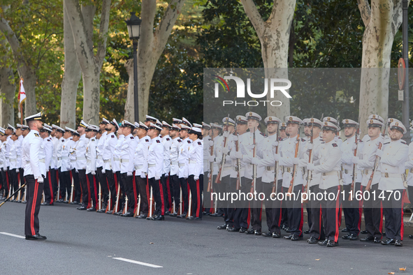 The Mayor of Madrid, Jose Luis Martinez-Almeida, presents a new national flag to the Marine Infantry Grouping of Madrid, donated by the Madr...