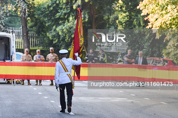 The Mayor of Madrid, Jose Luis Martinez-Almeida, presents a new national flag to the Marine Infantry Grouping of Madrid, donated by the Madr...