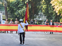 The Mayor of Madrid, Jose Luis Martinez-Almeida, presents a new national flag to the Marine Infantry Grouping of Madrid, donated by the Madr...