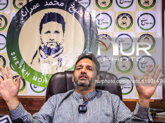 Former Srinagar Deputy Mayor Sheikh Mohammed Imran, who contests Assembly elections from the Khaniyar constituency, speaks to the media at h...