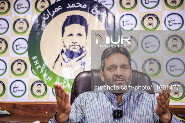 Former Srinagar Deputy Mayor Sheikh Mohammed Imran, who contests Assembly elections from the Khaniyar constituency, speaks to the media at h...