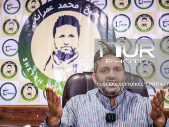 Former Srinagar Deputy Mayor Sheikh Mohammed Imran, who contests Assembly elections from the Khaniyar constituency, speaks to the media at h...