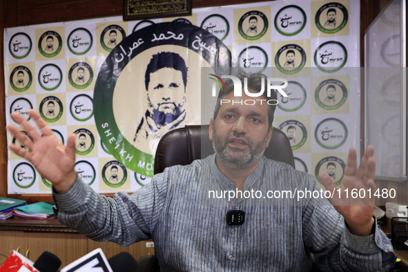 Former Srinagar Deputy Mayor Sheikh Mohammed Imran, who contests Assembly elections from the Khaniyar constituency, speaks to the media at h...