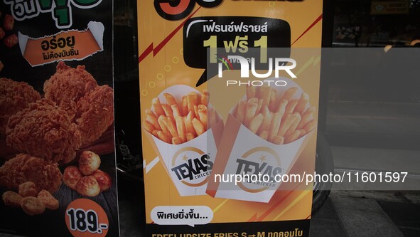 An advertisement at Texas Chicken restaurant on Silom Road in Bangkok, Thailand, on September 23, 2024. Texas Chicken is the international f...