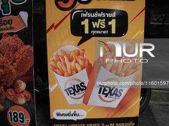 An advertisement at Texas Chicken restaurant on Silom Road in Bangkok, Thailand, on September 23, 2024. Texas Chicken is the international f...