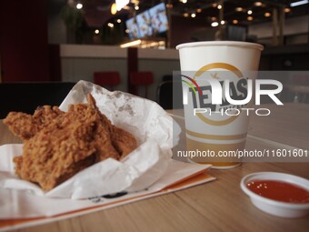 Fried chicken and a drink at the Texas Chicken restaurant near Victory Monument in Bangkok, Thailand, on September 23, 2024. Texas Chicken i...