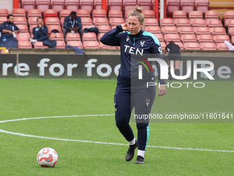 Laura Kaminski, manager of Crystal Palace Women, participates in the pre-match warm-up during the Barclays FA Women's Super League soccer ma...