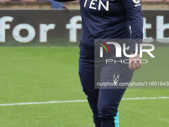 Laura Kaminski, manager of Crystal Palace Women, participates in the pre-match warm-up during the Barclays FA Women's Super League soccer ma...