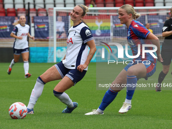 Martha Thomas of Tottenham Hotspur Women holds off Aimee Everett of Crystal Palace Women during the Barclays FA Women's Super League soccer...