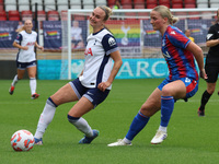 Martha Thomas of Tottenham Hotspur Women holds off Aimee Everett of Crystal Palace Women during the Barclays FA Women's Super League soccer...