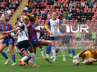 Becky Spencer of Tottenham Hotspur Women (Yellow) participates in the pre-match warm-up during the Barclays FA Women's Super League soccer m...