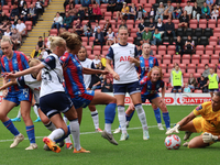 Becky Spencer of Tottenham Hotspur Women (Yellow) participates in the pre-match warm-up during the Barclays FA Women's Super League soccer m...