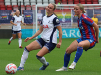 Martha Thomas of Tottenham Hotspur Women holds off Aimee Everett of Crystal Palace Women during the Barclays FA Women's Super League soccer...