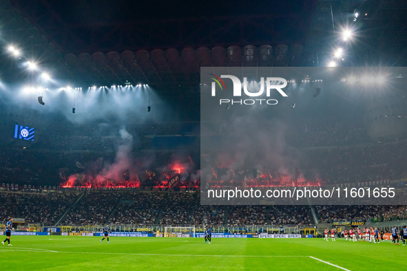 AC Milan supporters during the Italian championship Serie A football match between FC Internazionale and AC Milan in Milan, Italy, on Septem...