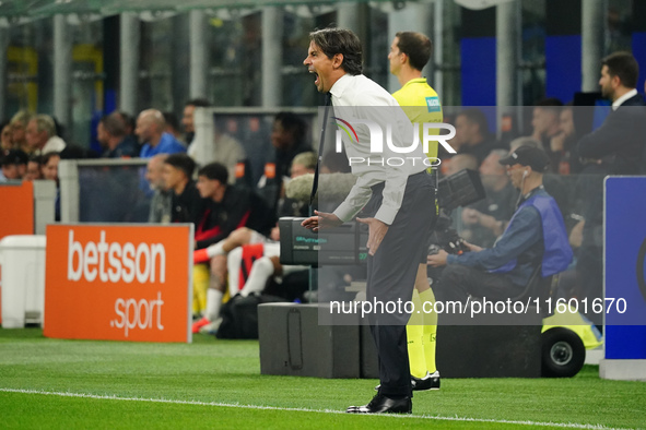 The head coach Simone Inzaghi (FC Inter) screams during the Italian championship Serie A football match between FC Internazionale and AC Mil...