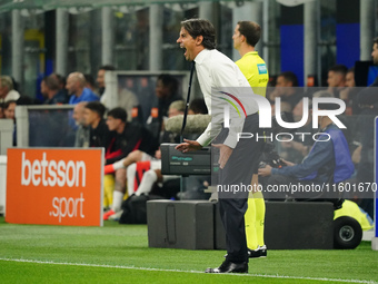 The head coach Simone Inzaghi (FC Inter) screams during the Italian championship Serie A football match between FC Internazionale and AC Mil...