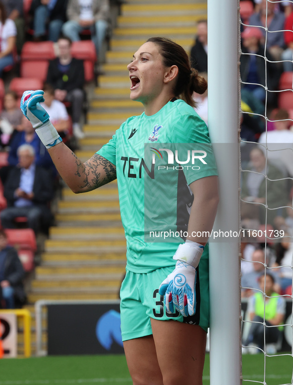 Shae Yanez of Crystal Palace Women gets beaten by Olga Ahtinen of Tottenham Hotspur Women during the Barclays FA Women's Super League soccer...