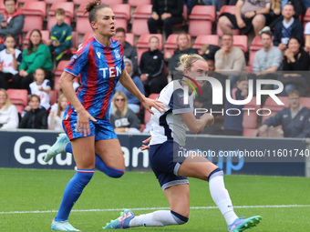 Katrine Veje of Crystal Palace Women and Martha Thomas of Tottenham Hotspur Women are in action during the Barclays FA Women's Super League...