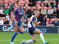 Katrine Veje of Crystal Palace Women and Martha Thomas of Tottenham Hotspur Women are in action during the Barclays FA Women's Super League...