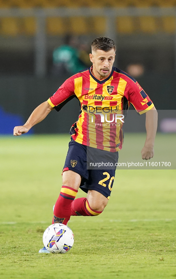 Ylber Ramadani of US Lecce is in action during the Serie A match between Lecce and Parma in Lecce, Italy, on September 21, 2024. 