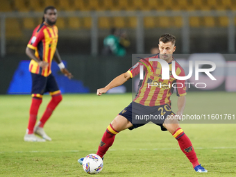 Ylber Ramadani of US Lecce is in action during the Serie A match between Lecce and Parma in Lecce, Italy, on September 21, 2024. (