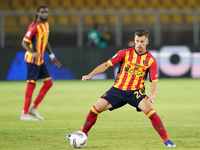 Ylber Ramadani of US Lecce is in action during the Serie A match between Lecce and Parma in Lecce, Italy, on September 21, 2024. (