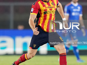 Federico Baschirotto of US Lecce is in action during the Serie A match between Lecce and Parma in Lecce, Italy, on September 21, 2024. (