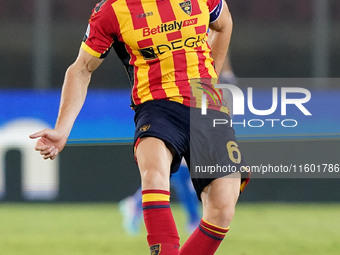 Federico Baschirotto of US Lecce is in action during the Serie A match between Lecce and Parma in Lecce, Italy, on September 21, 2024. (