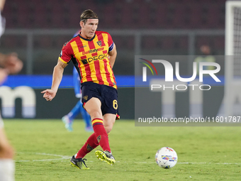 Federico Baschirotto of US Lecce is in action during the Serie A match between Lecce and Parma in Lecce, Italy, on September 21, 2024. (