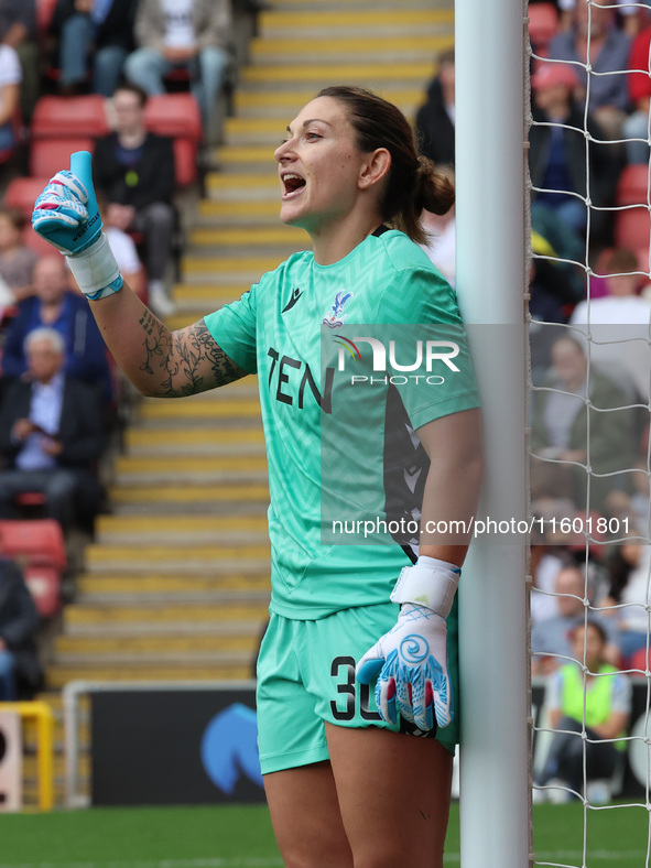 Shae Yanez of Crystal Palace Women gets beaten by Olga Ahtinen of Tottenham Hotspur Women during the Barclays FA Women's Super League soccer...