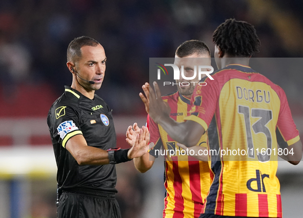 Referee Marco Guida officiates the Serie A match between Lecce and Parma in Lecce, Italy, on September 21, 2024. 