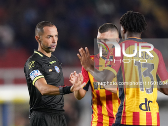 Referee Marco Guida officiates the Serie A match between Lecce and Parma in Lecce, Italy, on September 21, 2024. (