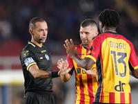 Referee Marco Guida officiates the Serie A match between Lecce and Parma in Lecce, Italy, on September 21, 2024. (