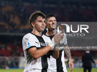 Players of Parma applaud the fans following the final whistle of the Serie A match between Lecce and Parma in Lecce, Italy, on September 21,...