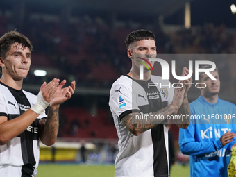 Players of Parma applaud the fans following the final whistle of the Serie A match between Lecce and Parma in Lecce, Italy, on September 21,...